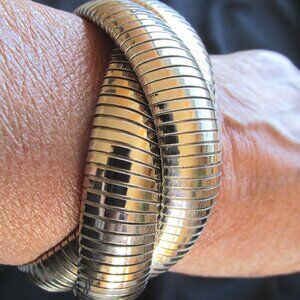 Janis Savitt triple silver cobra omega bracelet.
